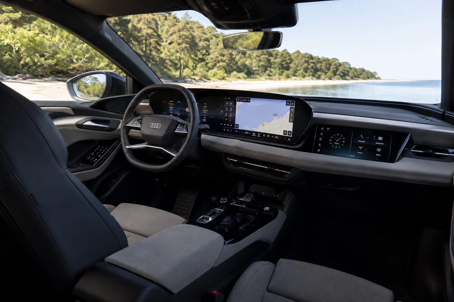 Audi A6 Avant e-tron-kabine set skråt fra højre bagsæde med alle fabriksmonterede skærme tændt
