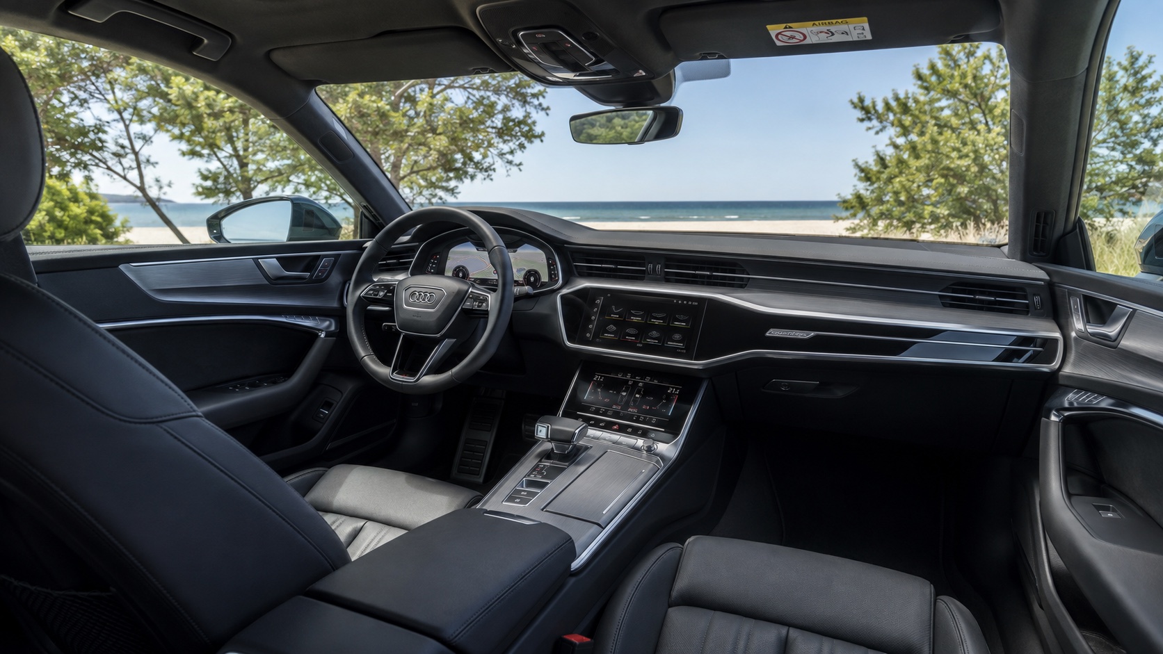 Audi A7 C8-interiør set fra højre bagsæde med Virtual Cockpit og begge MMI-skærme tændt