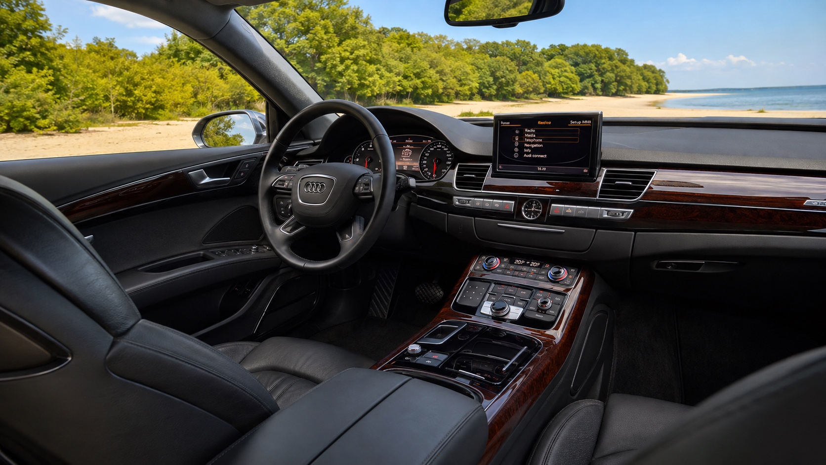Audi A8 D4-interiør set fra højre bagsæde med fabrikkens MMI og instrumenter tændt