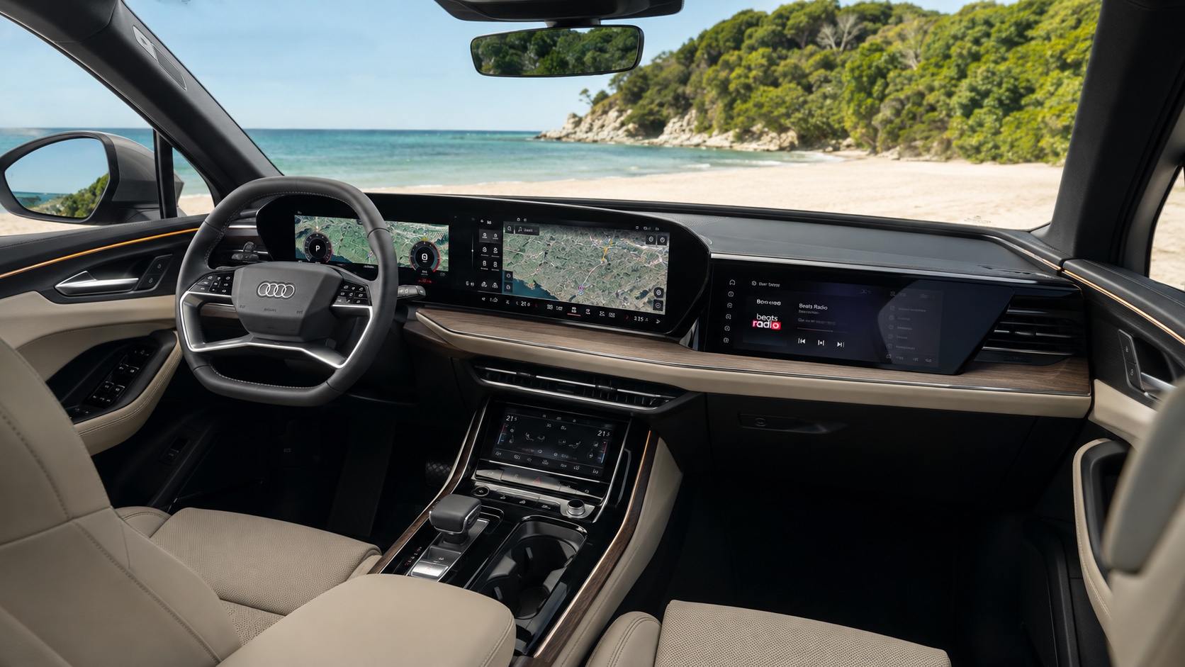 Audi Q7 2026-interiør set skråt fra højre bagsæde med panoramadisplay og passagerskærm tændt