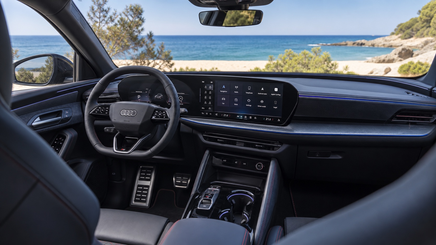 Audi SQ5 SUV GU-interiør set skråt fra højre bagsæde med OLED-instrumenter og MMI-skærm tændt