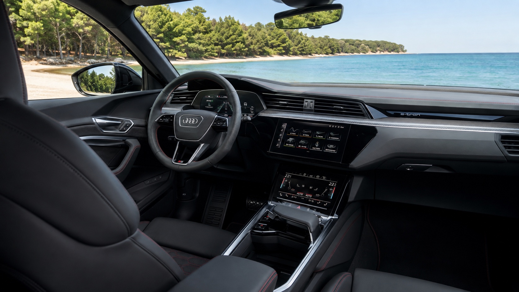 Audi SQ8 e-tron-kabine set skråt fra højre bagsæde med alle fabriksmonterede skærme tændt