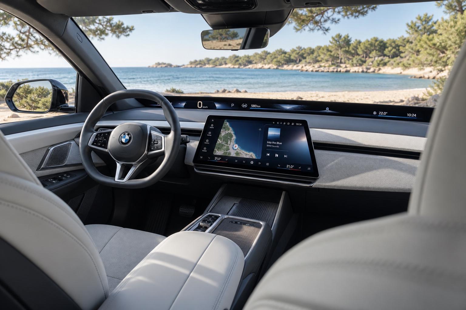 Interiøret i BMW i3 50 xDrive med Panoramic Vision og tændt central skærm