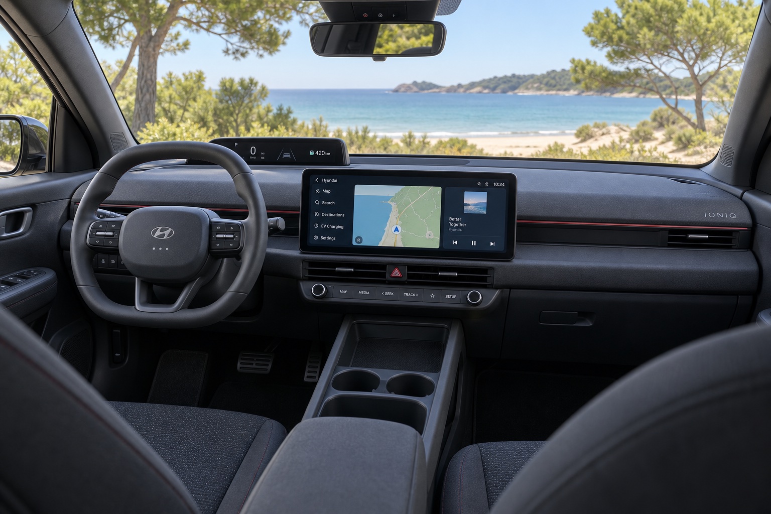 Hyundai IONIQ 3 med tændt centralskærm og instrumentbord set fra højre bagsæde
