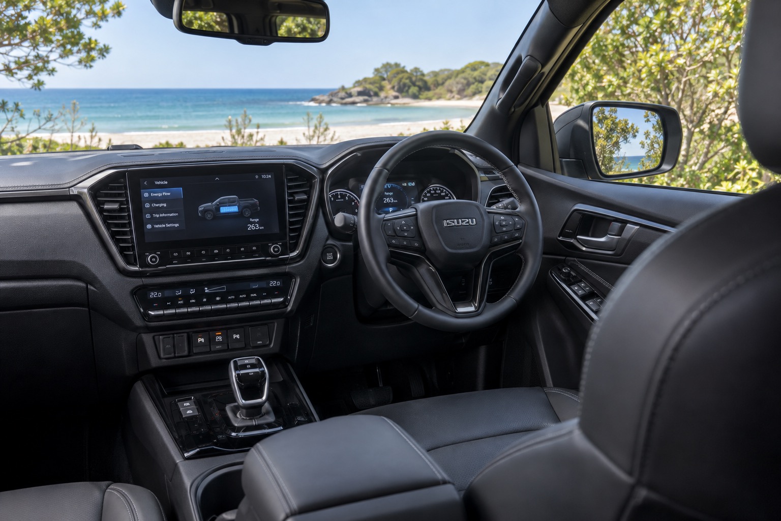 Kabinen i Isuzu D-Max EV med tændte skærme