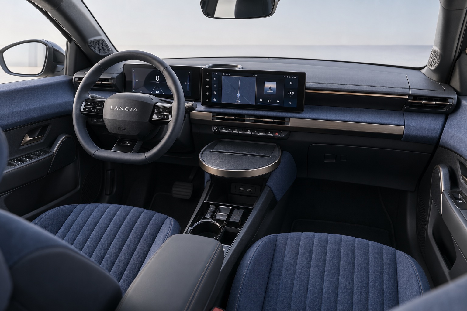 Illustration af Lancia Ypsilon-kabine med skærme og rundt bord