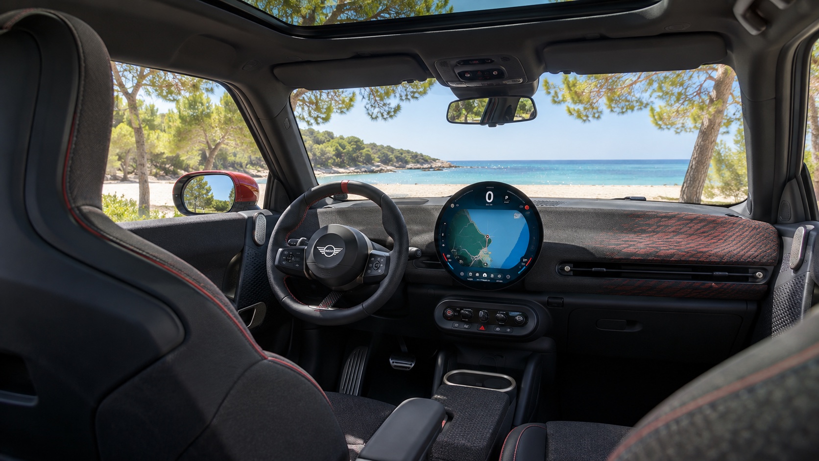 Interiøret i MINI John Cooper Works Electric med tændt OLED-skærm